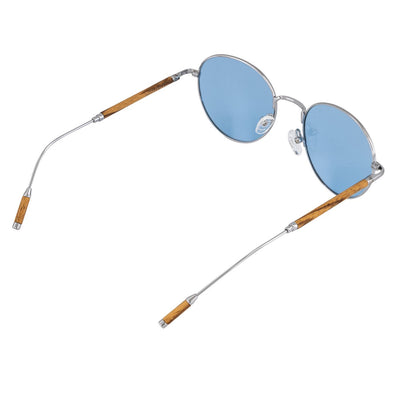 Sonnenbrille von Woodenlove mit blauen TAC Gläsern und Zebraholz mit Woodenlove LOGO
